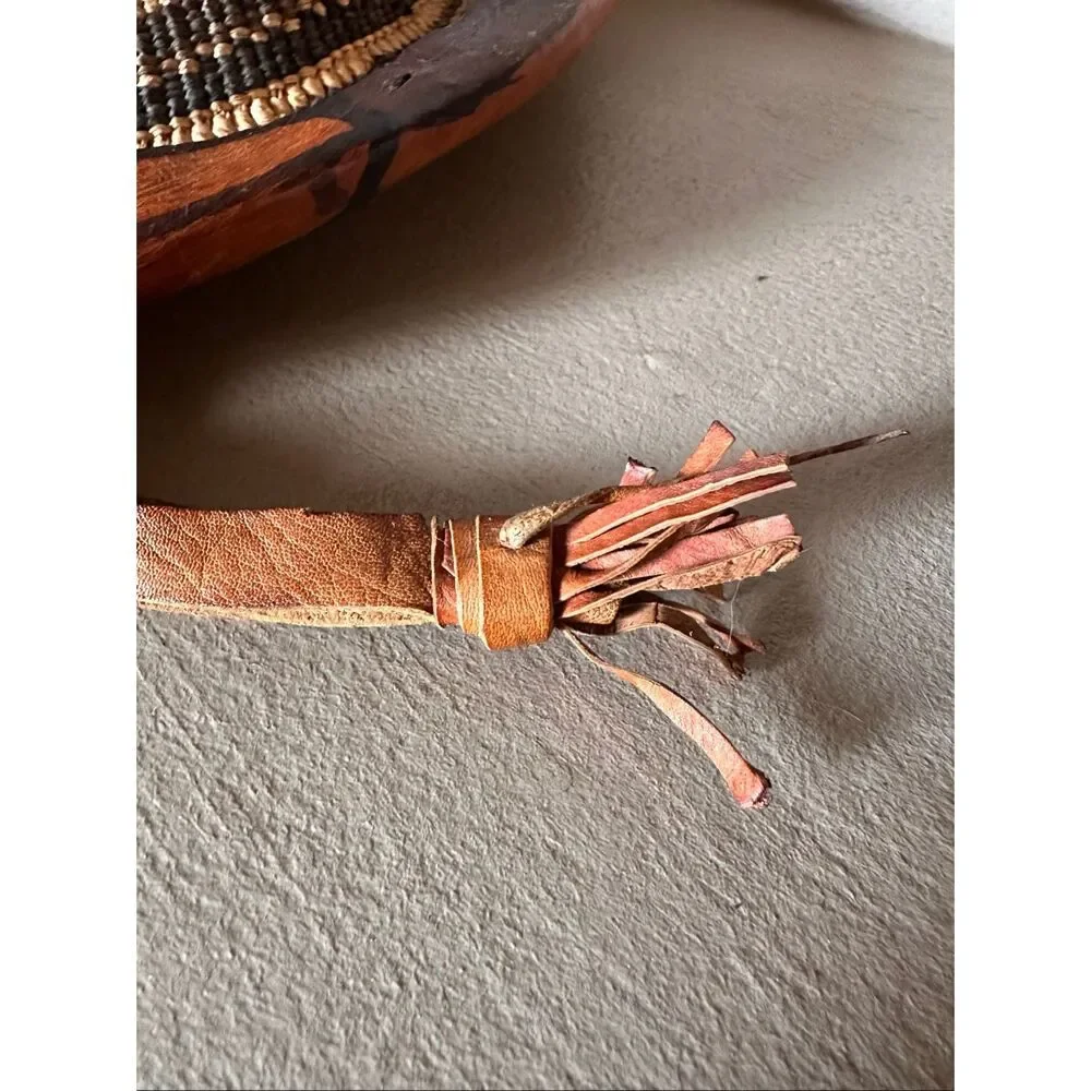 Vintage handwoven basketry hat with leather trim. Tribal/Boho decor